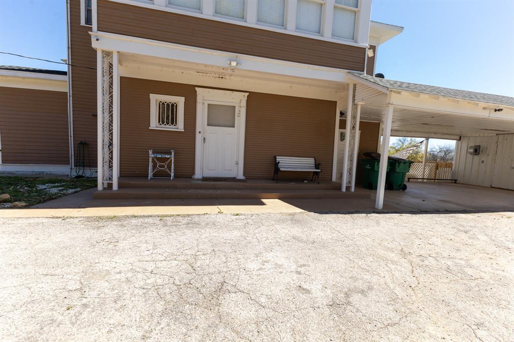 1115 Austin Street Coleman, TX 76834 - Photo 30 of 40 a view of a house with a patio