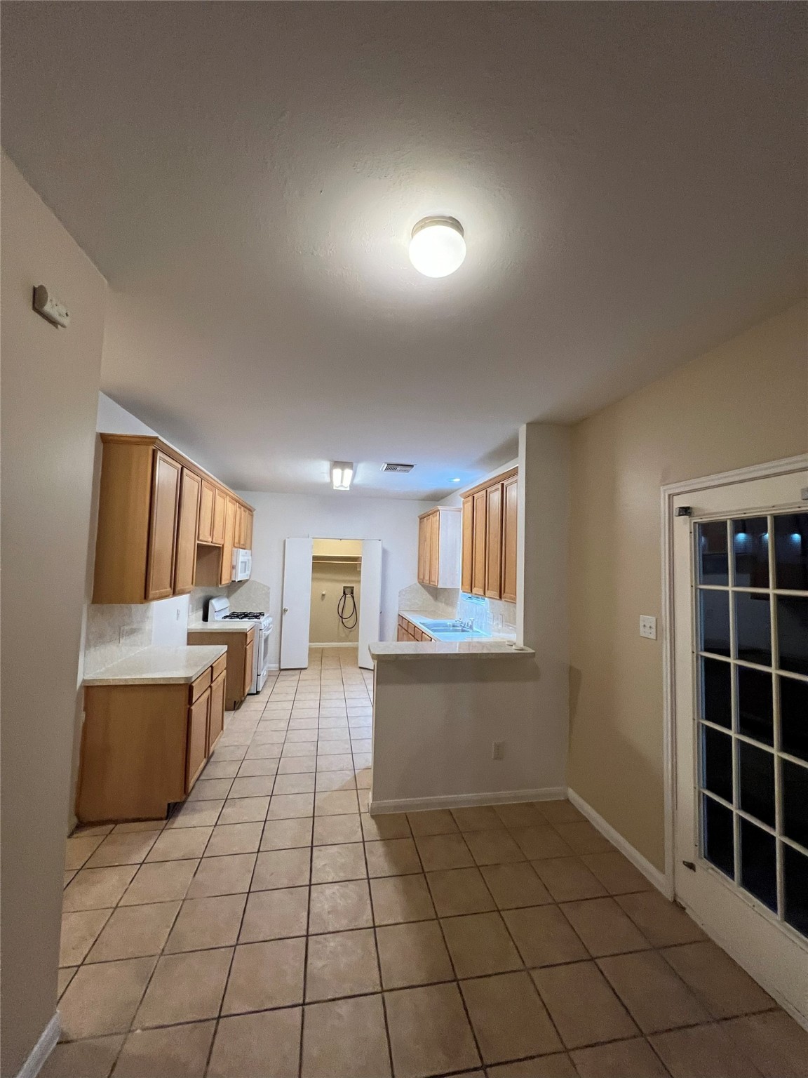 4018 Longway Estates Court Fresno, TX 77545 - Photo 6 of 20 a view of kitchen and window