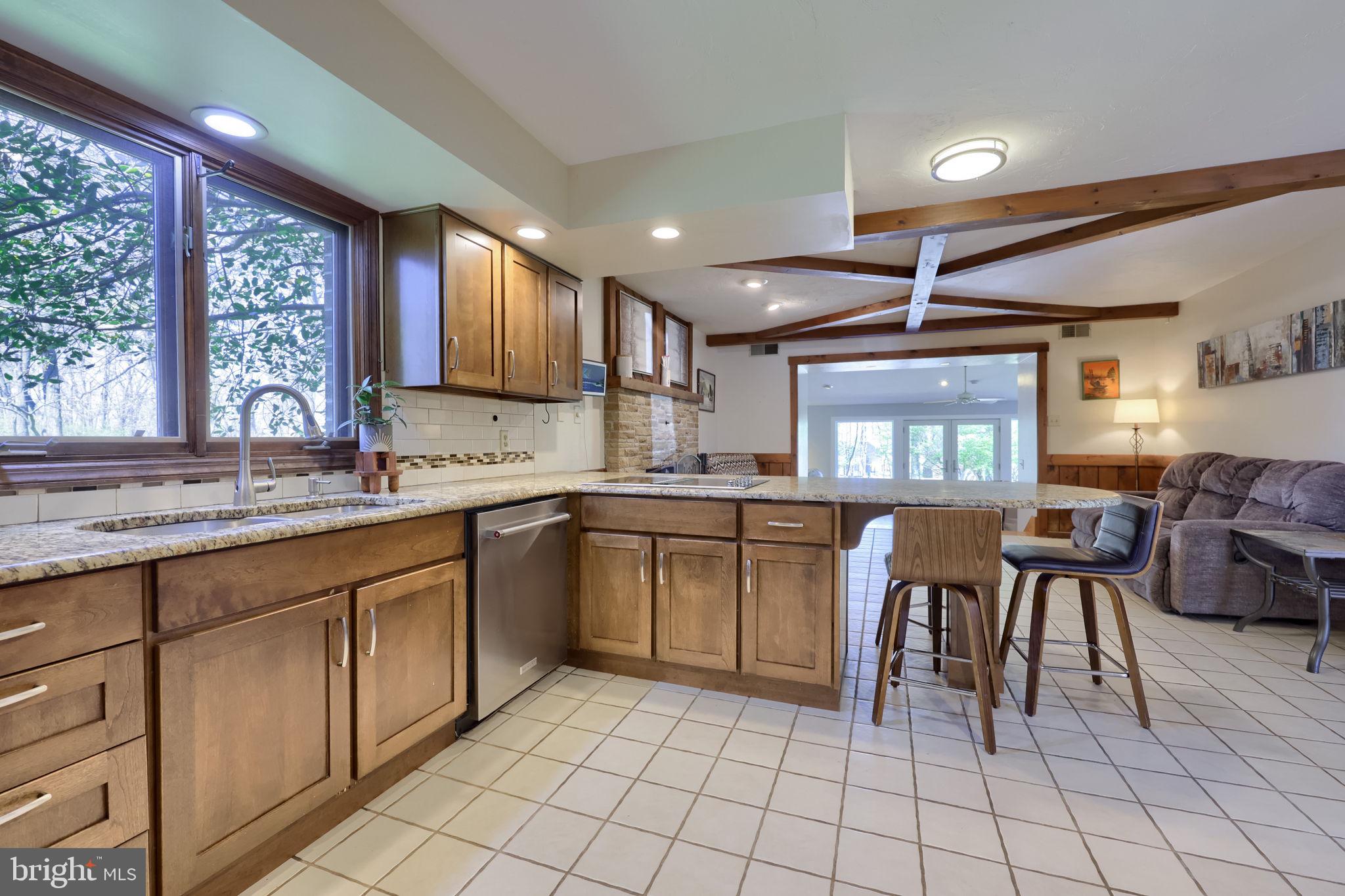 2211 Rocky Ridge Court York, PA 17406 - Photo 12 of 48 a kitchen with sink cabinets and window