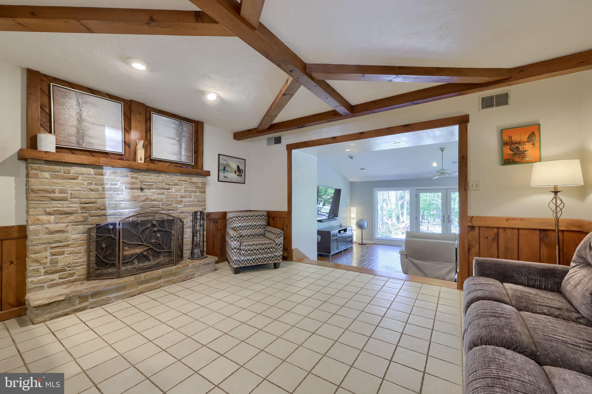 2211 Rocky Ridge Court York, PA 17406 - Photo 19 of 48 a living room with furniture and a fireplace