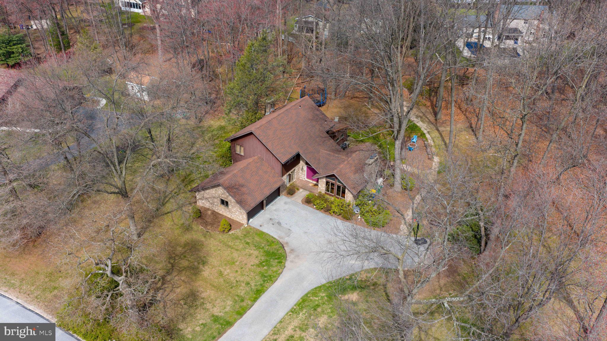 2211 Rocky Ridge Court York, PA 17406 - Photo 2 of 48 an aerial view of a house with a yard and trees