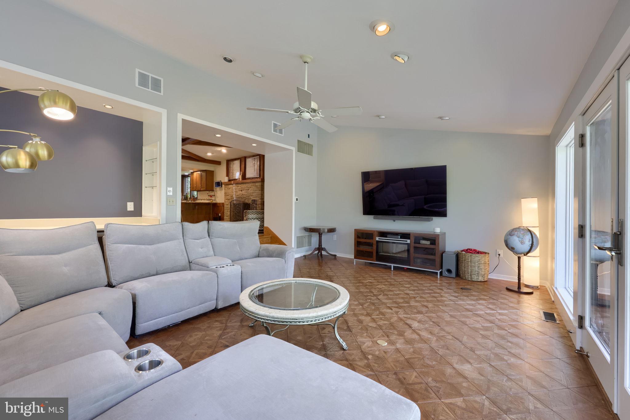 2211 Rocky Ridge Court York, PA 17406 - Photo 21 of 48 a living room with furniture and a flat screen tv