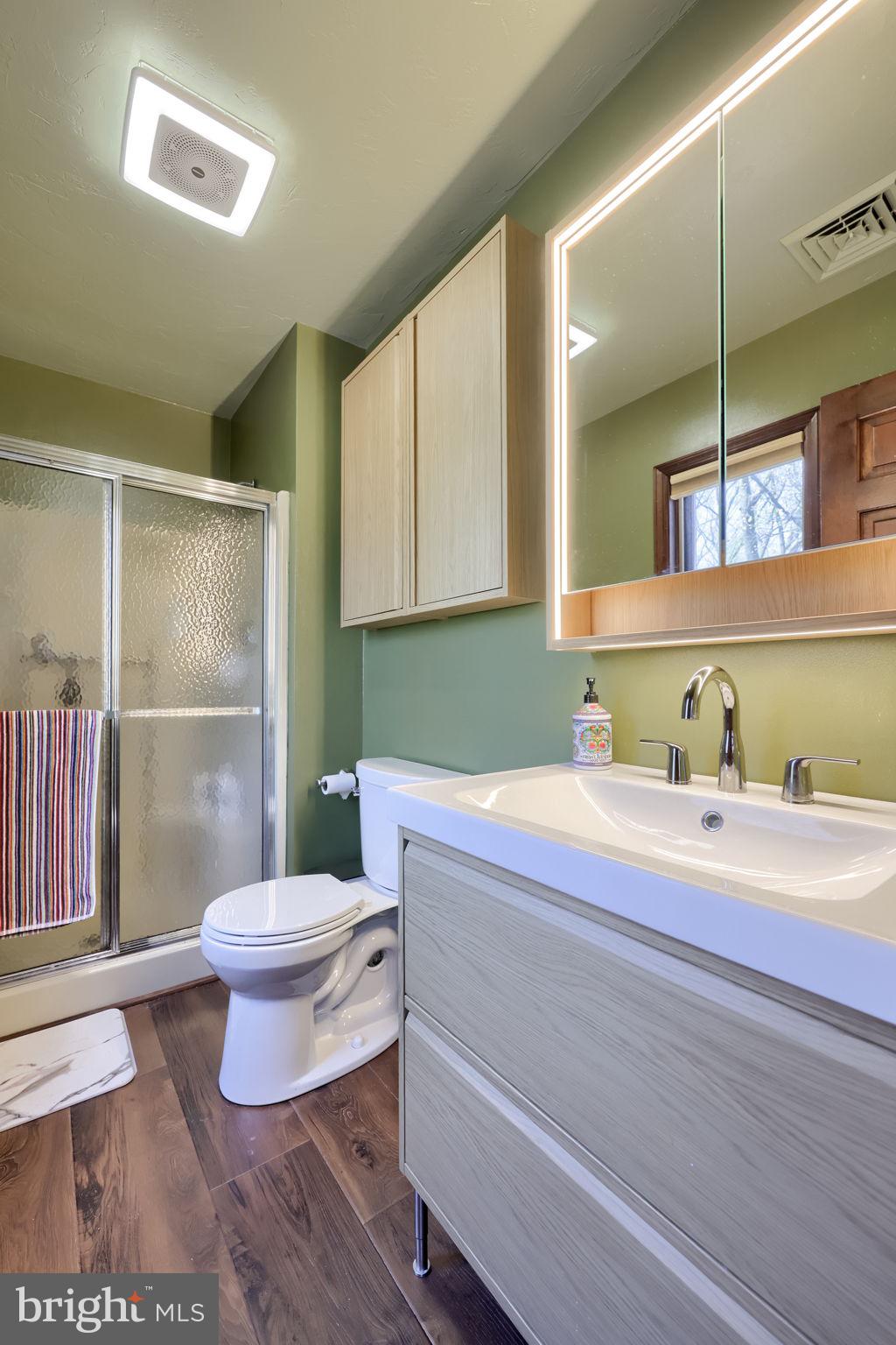 2211 Rocky Ridge Court York, PA 17406 - Photo 29 of 48 a bathroom with a sink a toilet and a mirror