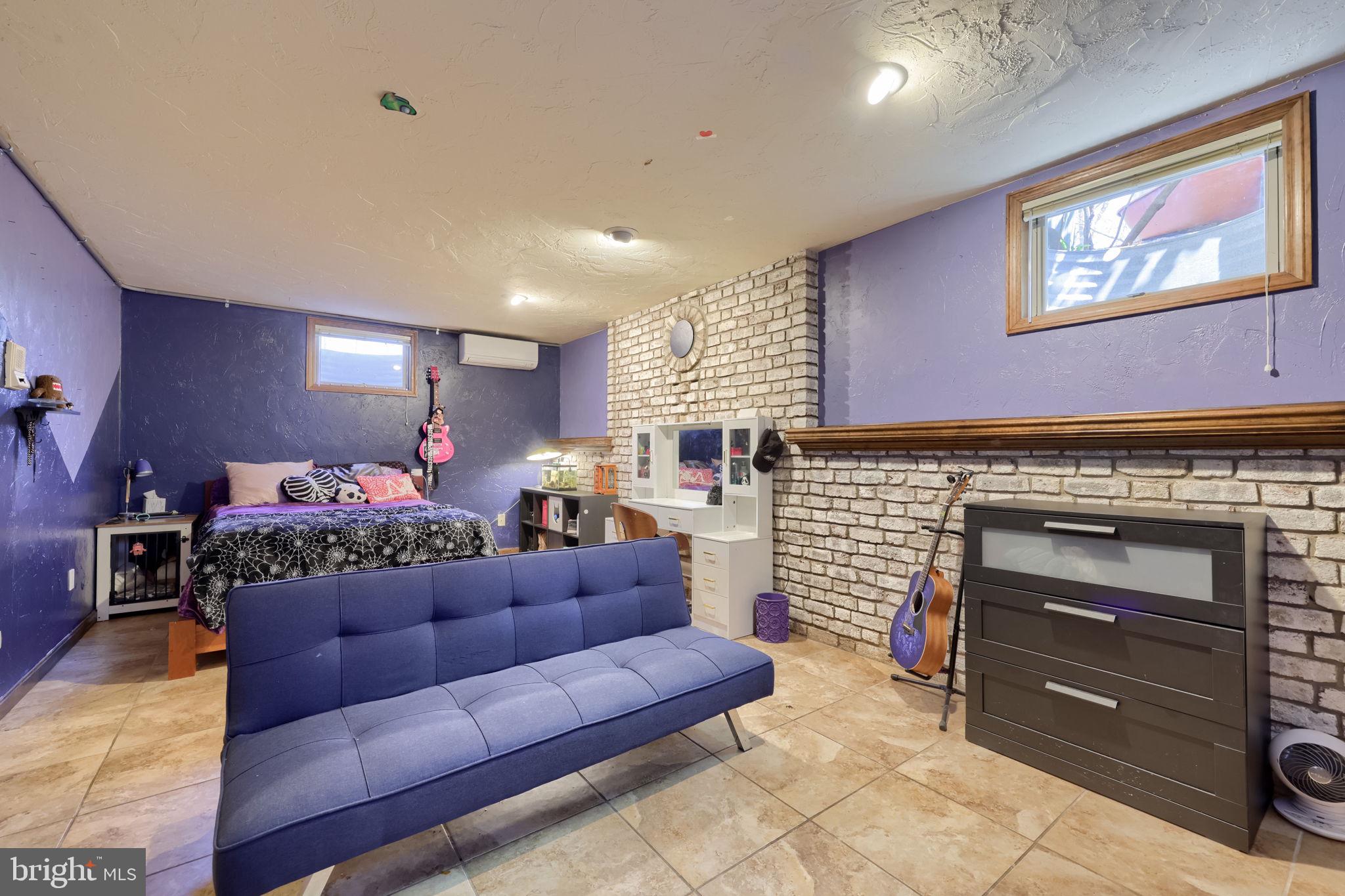 2211 Rocky Ridge Court York, PA 17406 - Photo 34 of 48 a living room with furniture and a fireplace