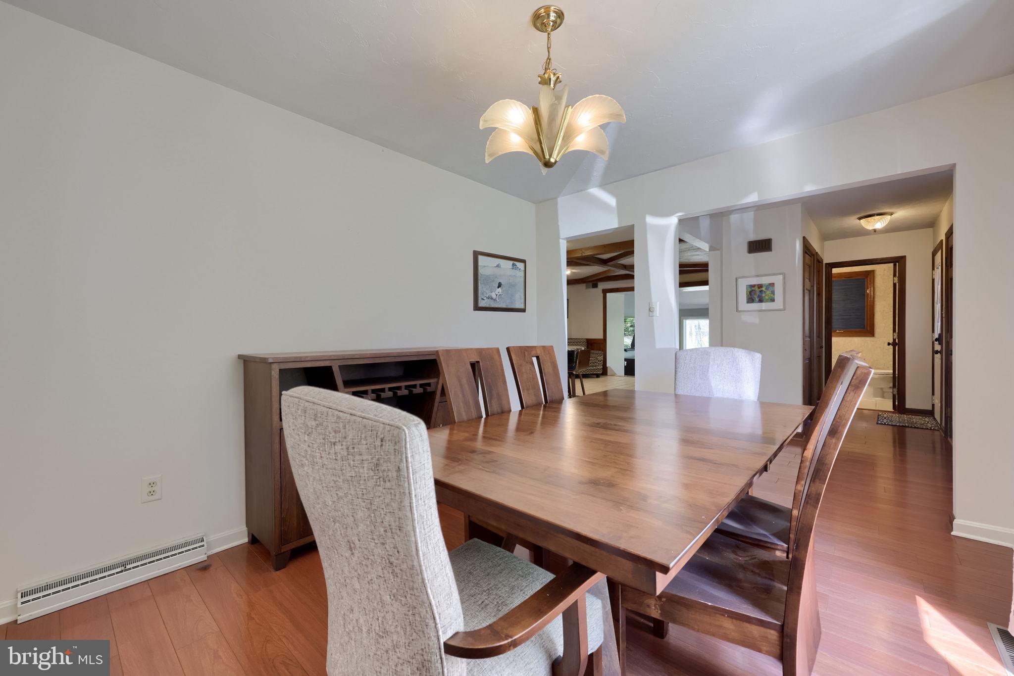 2211 Rocky Ridge Court York, PA 17406 - Photo 9 of 48 a view of a dining room with furniture and wooden floor