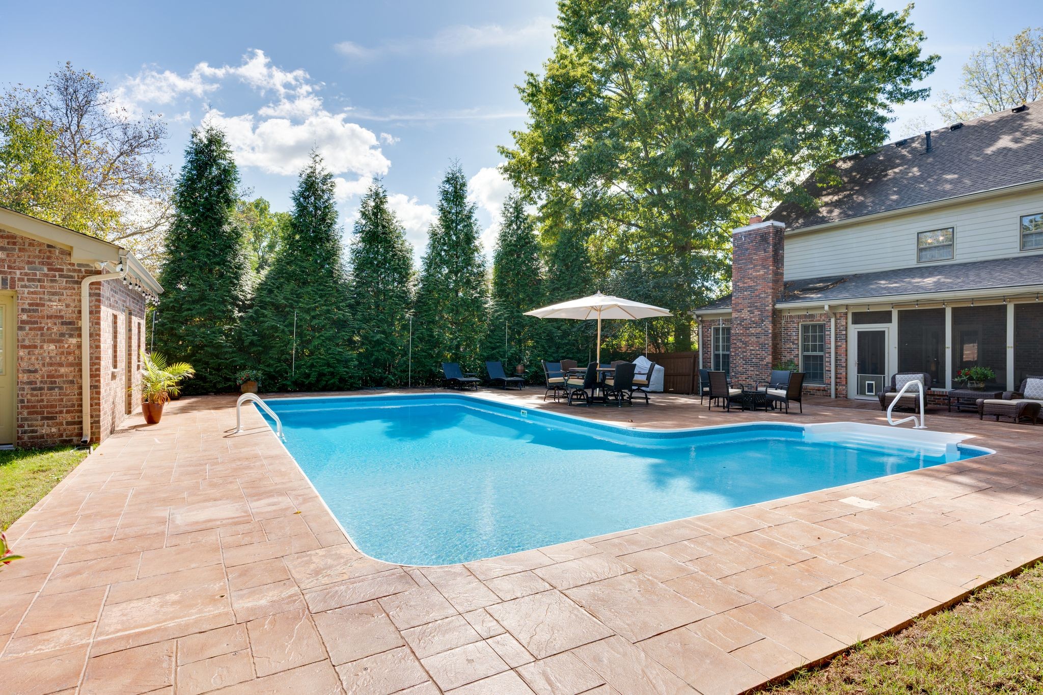 1400 Arrowhead Drive Brentwood, TN 37027 - Photo 11 of 15 a view of a swimming pool and lounge chairs in patio of house