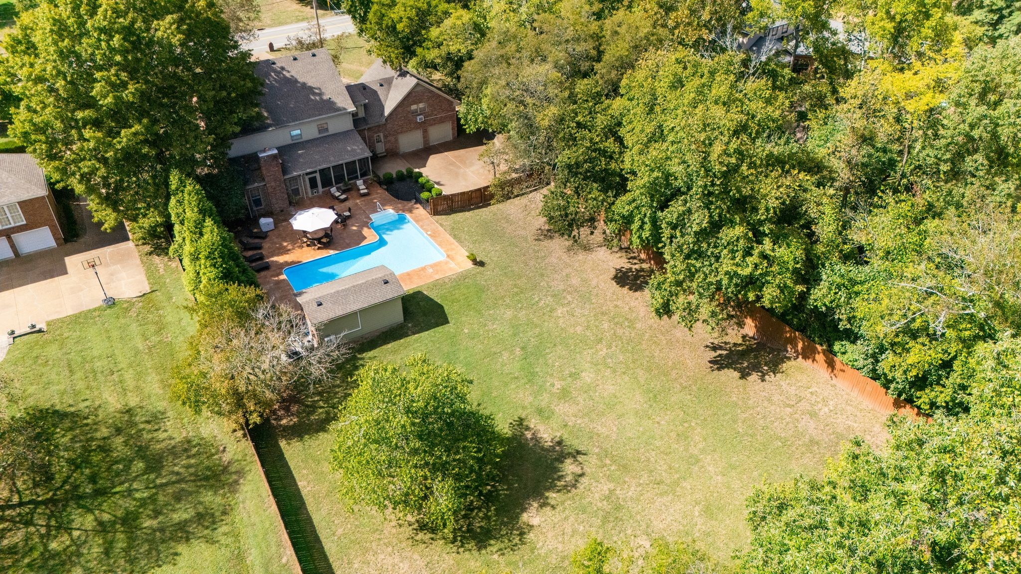 1400 Arrowhead Drive Brentwood, TN 37027 - Photo 5 of 15 an aerial view of residential house with swimming pool and lawn chairs