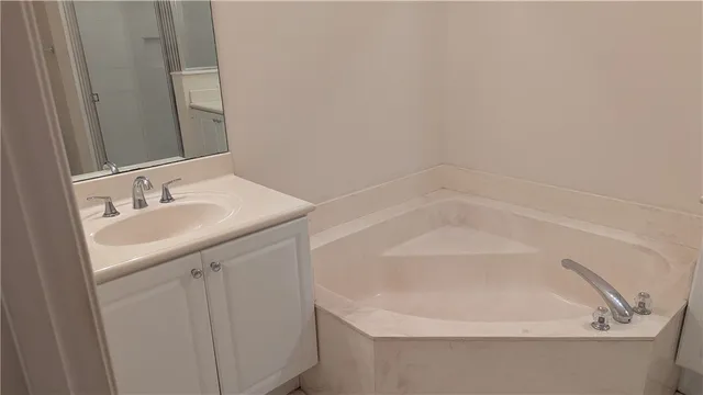 a bathroom with a sink and a bathtub