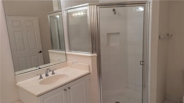a bathroom with a sink and mirror