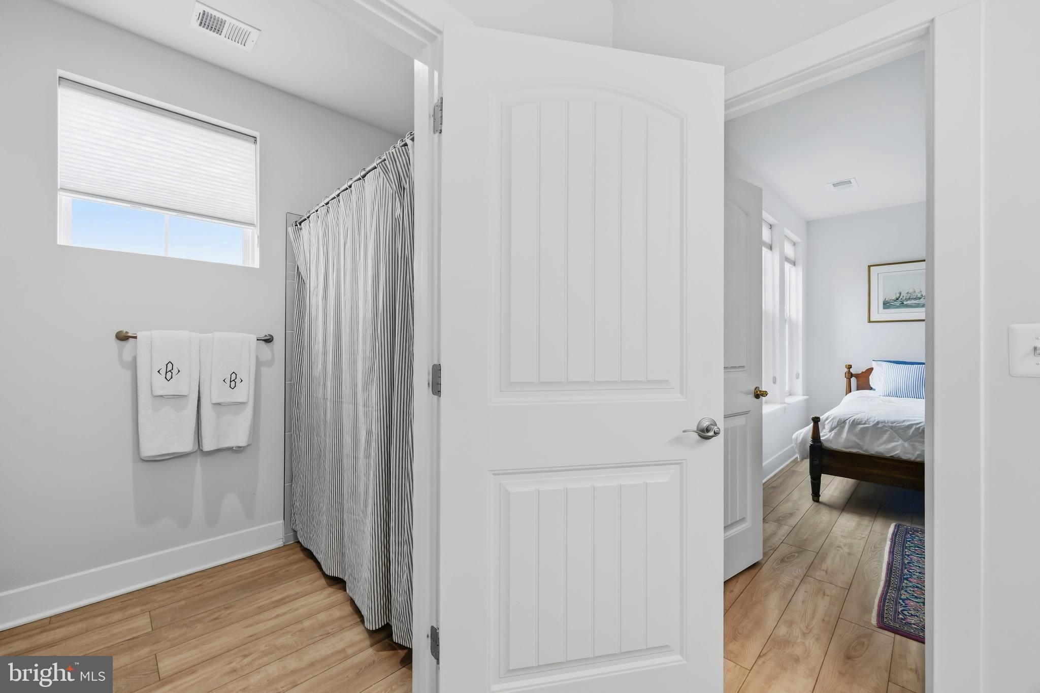 190 Harrier Way, Unit 24 Chester, MD 21619 - Photo 48 of 78 a view of a bedroom from the hallway