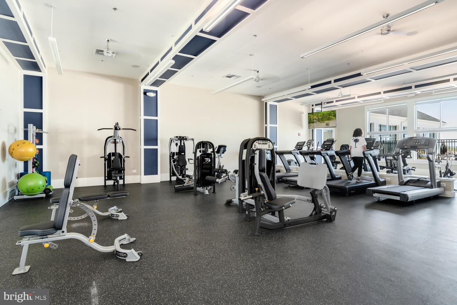 190 Harrier Way, Unit 24 Chester, MD 21619 - Photo 68 of 78 a view of a room with gym equipment