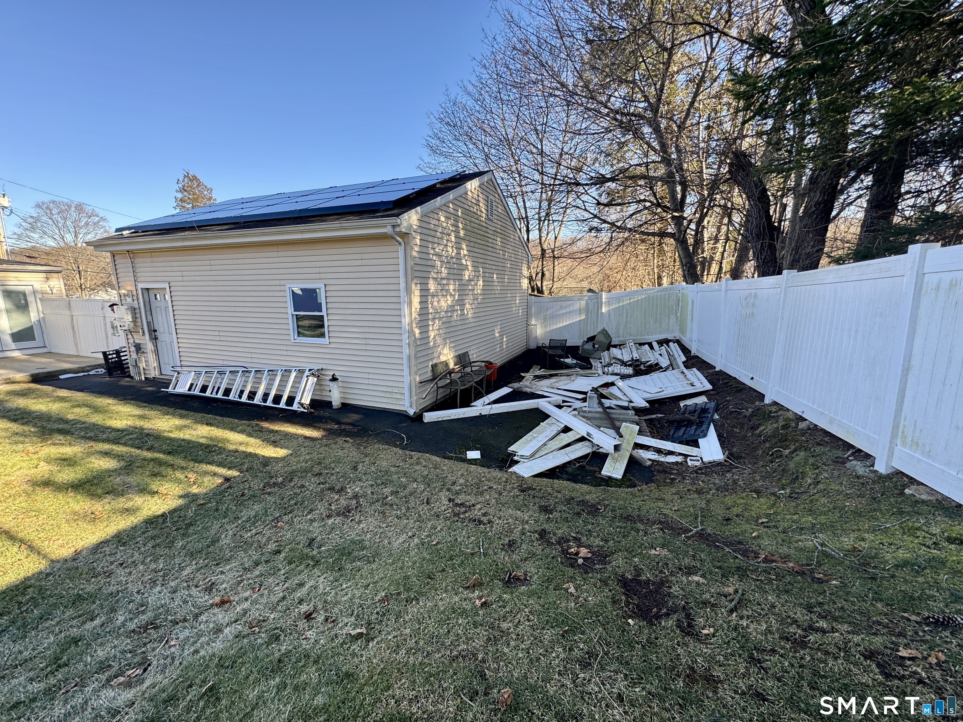 4 Hellstrom Road East Haven, CT 06512 - Photo 11 of 26 a view of a house with backyard and sitting area