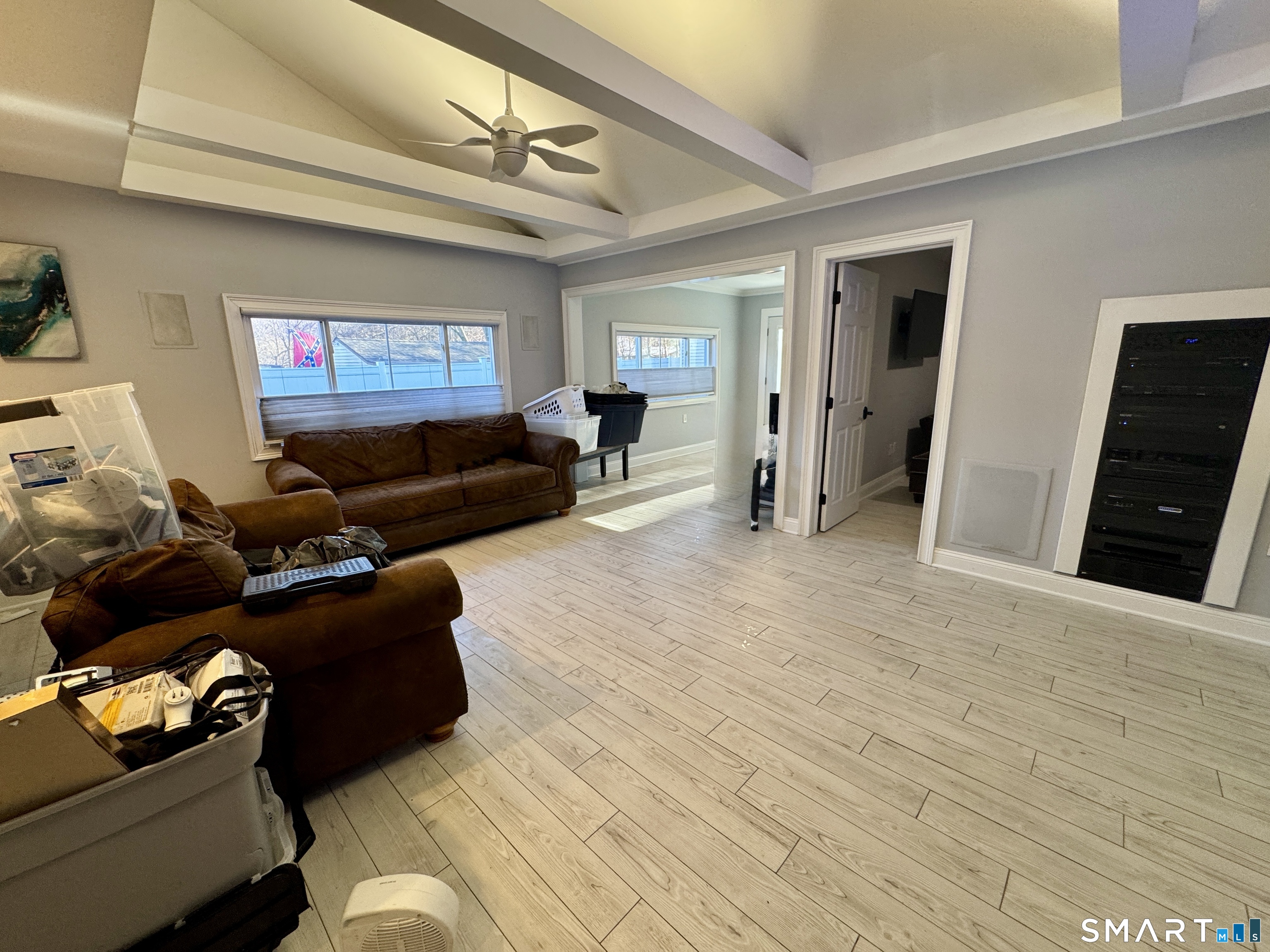 4 Hellstrom Road East Haven, CT 06512 - Photo 12 of 26 a living room with furniture and a flat screen tv