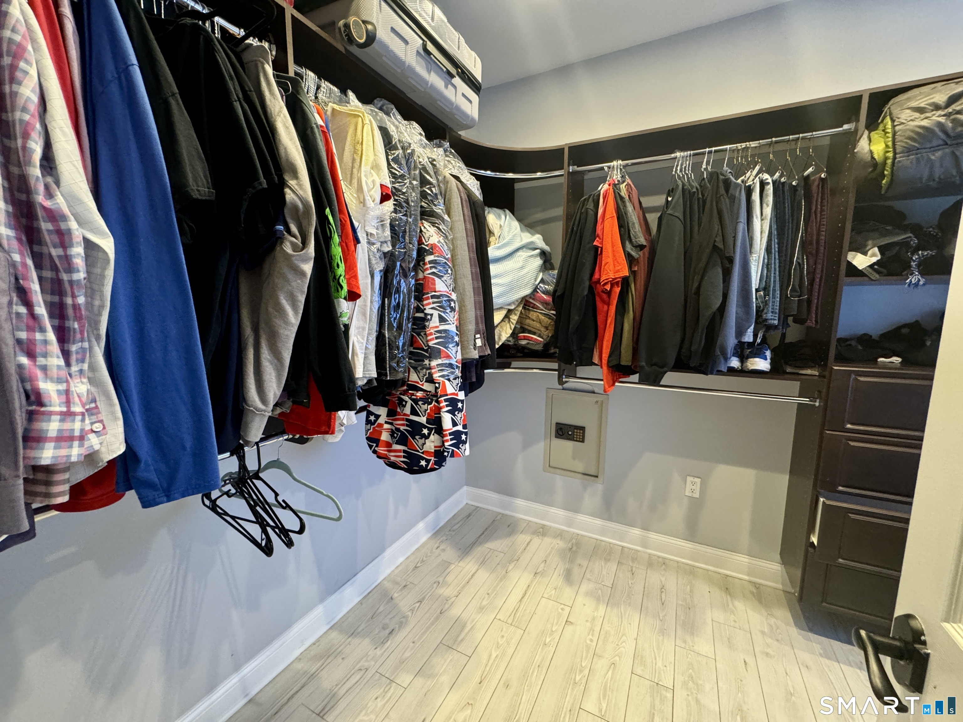 4 Hellstrom Road East Haven, CT 06512 - Photo 18 of 26 a view of walk in closet with clothes