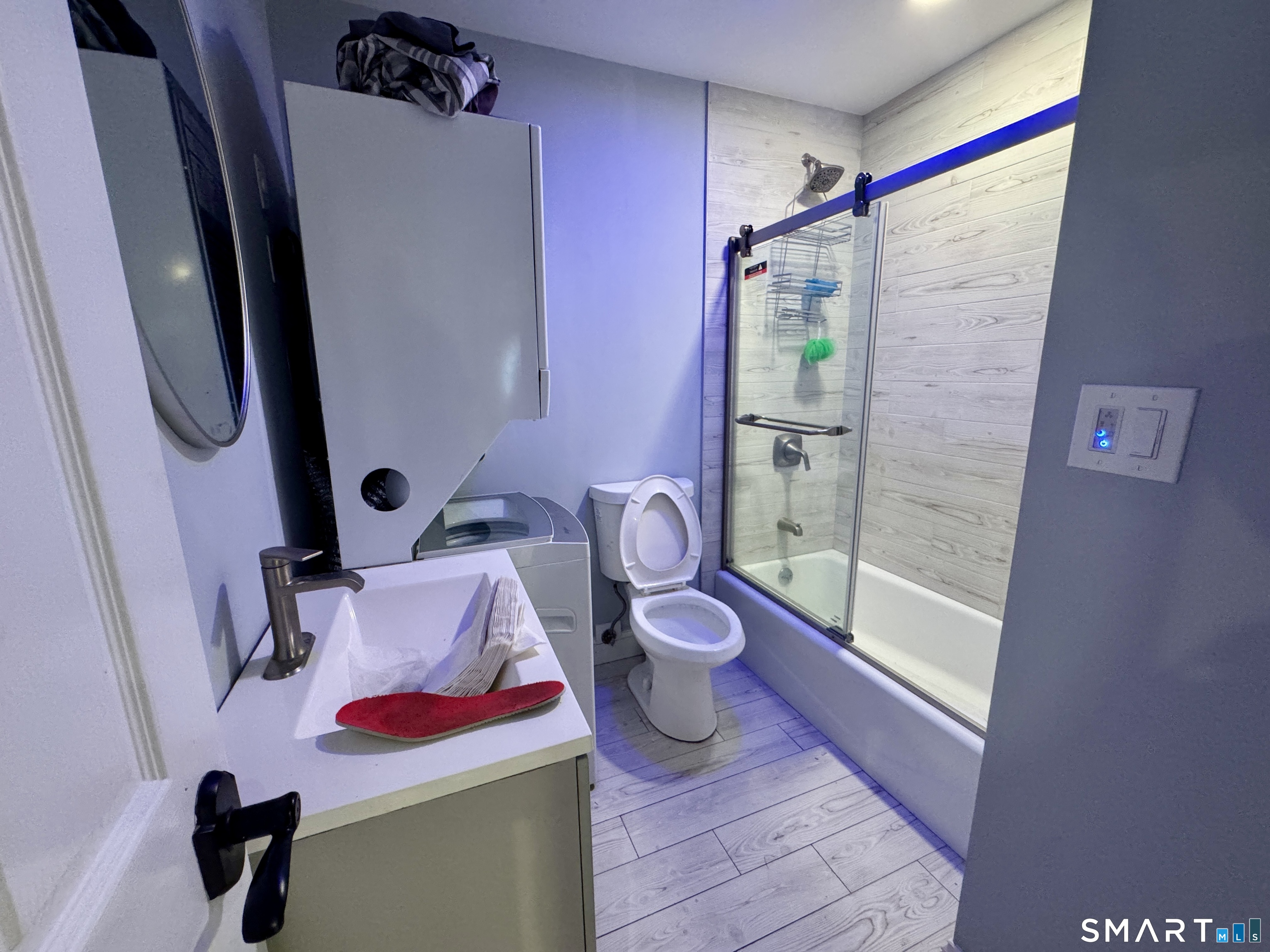 4 Hellstrom Road East Haven, CT 06512 - Photo 23 of 26 a bathroom with a sink and toilet