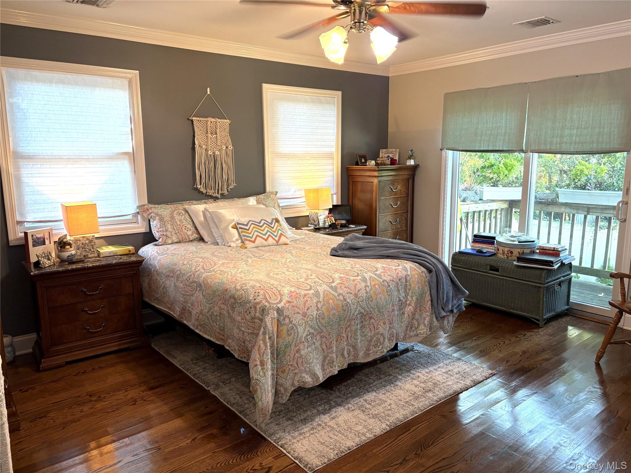 346 South Main Street Freeport, NY 11520 - Photo 13 of 33 Master Bedroom with crown molding, dark hardwood flooring, and a ceiling fan