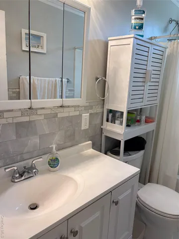 a view of a tree with a yard