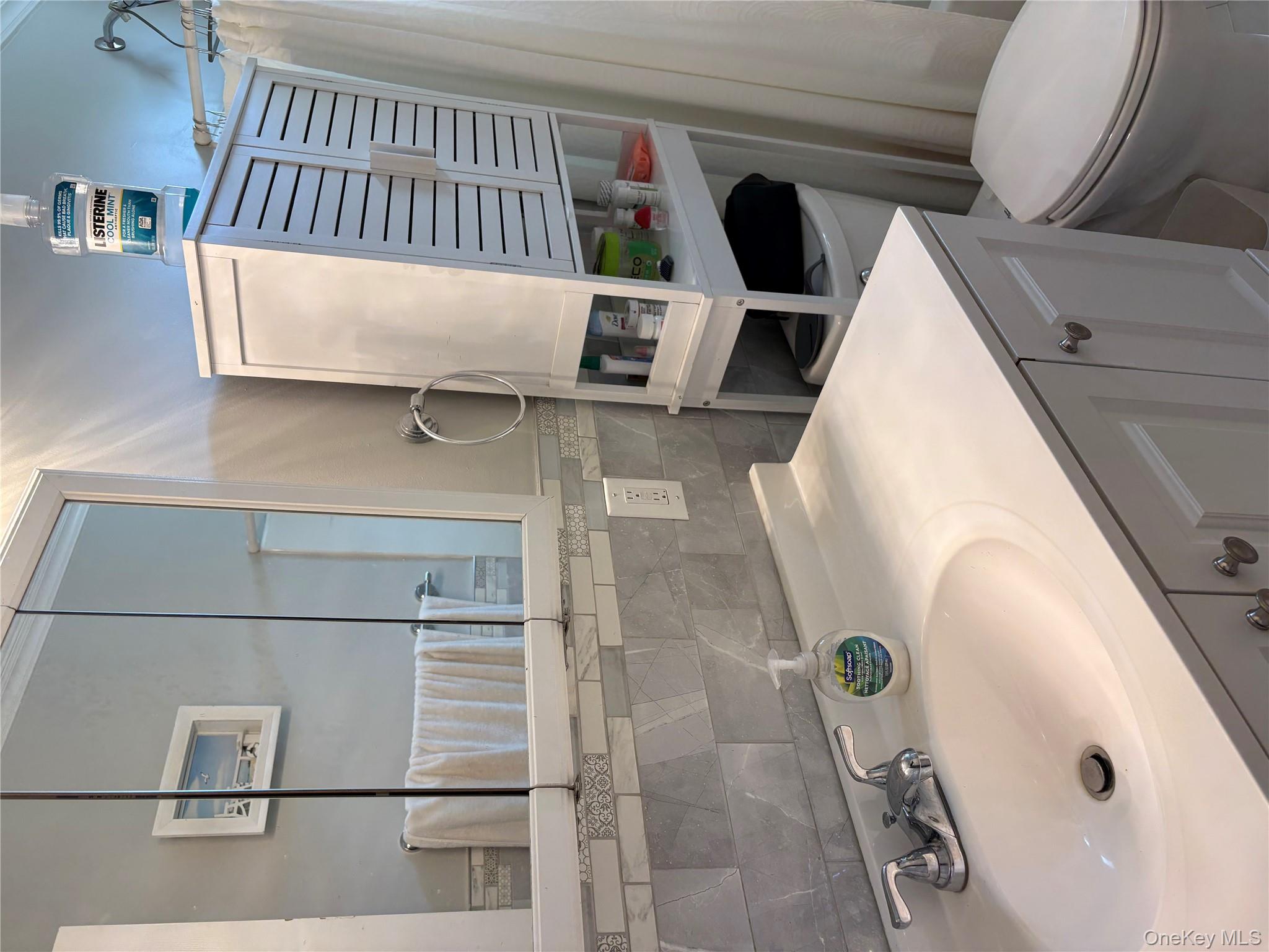 346 South Main Street Freeport, NY 11520 - Photo 23 of 33 a bathroom with a sink toilet and mirror