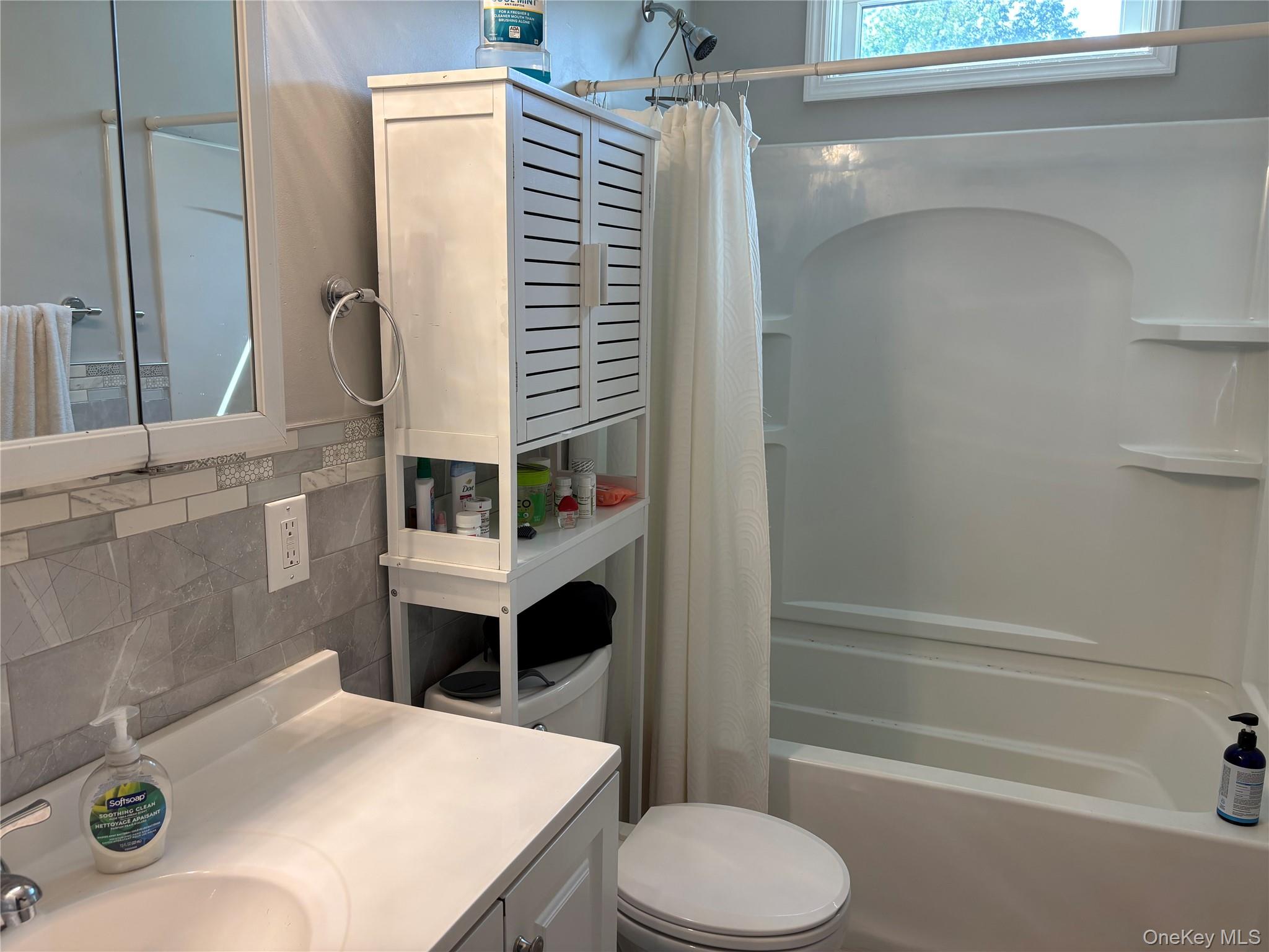 346 South Main Street Freeport, NY 11520 - Photo 24 of 33 a bathroom with a sink toilet and shower