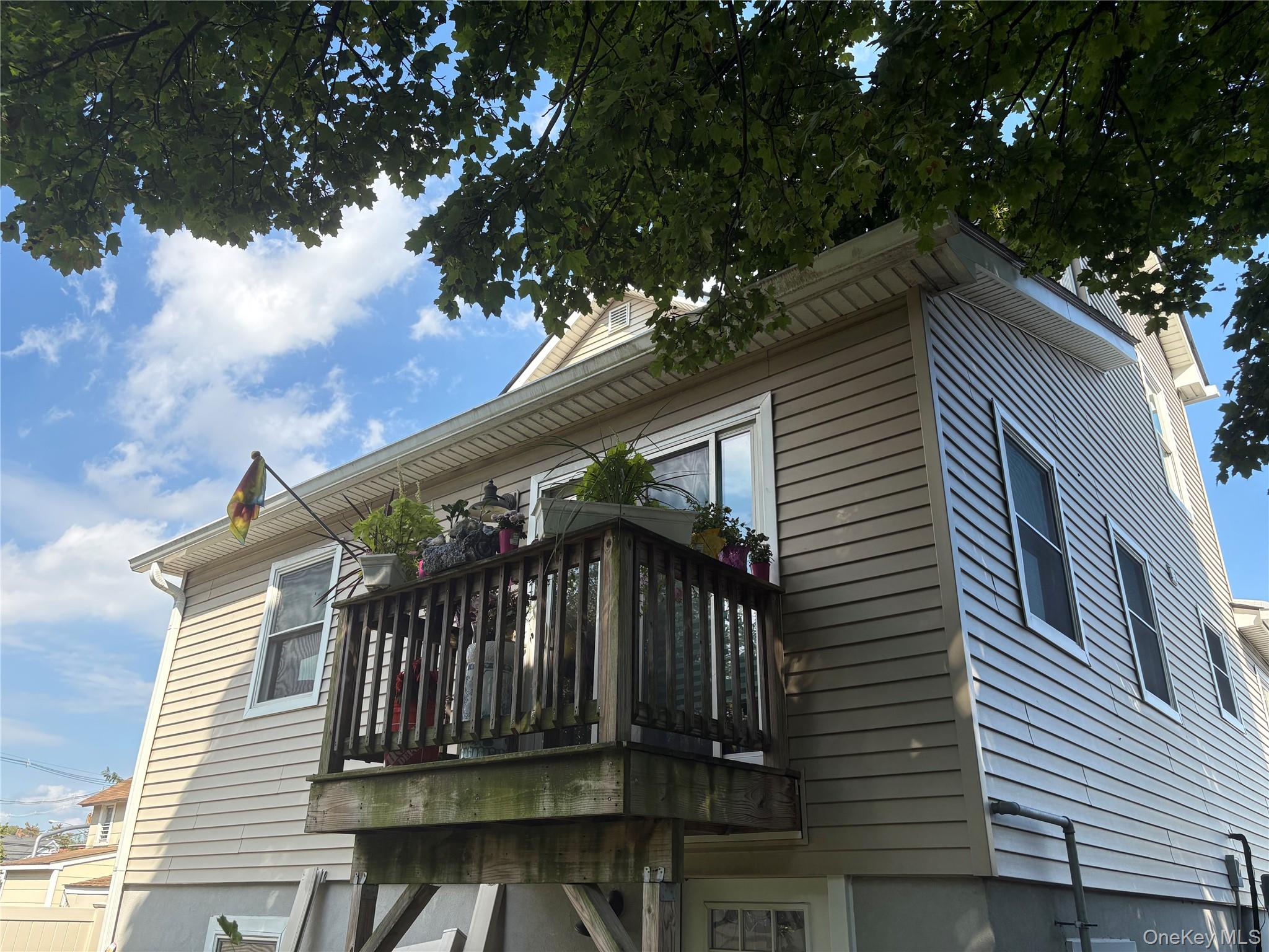 346 South Main Street Freeport, NY 11520 - Photo 32 of 33 a view of a house with a tree