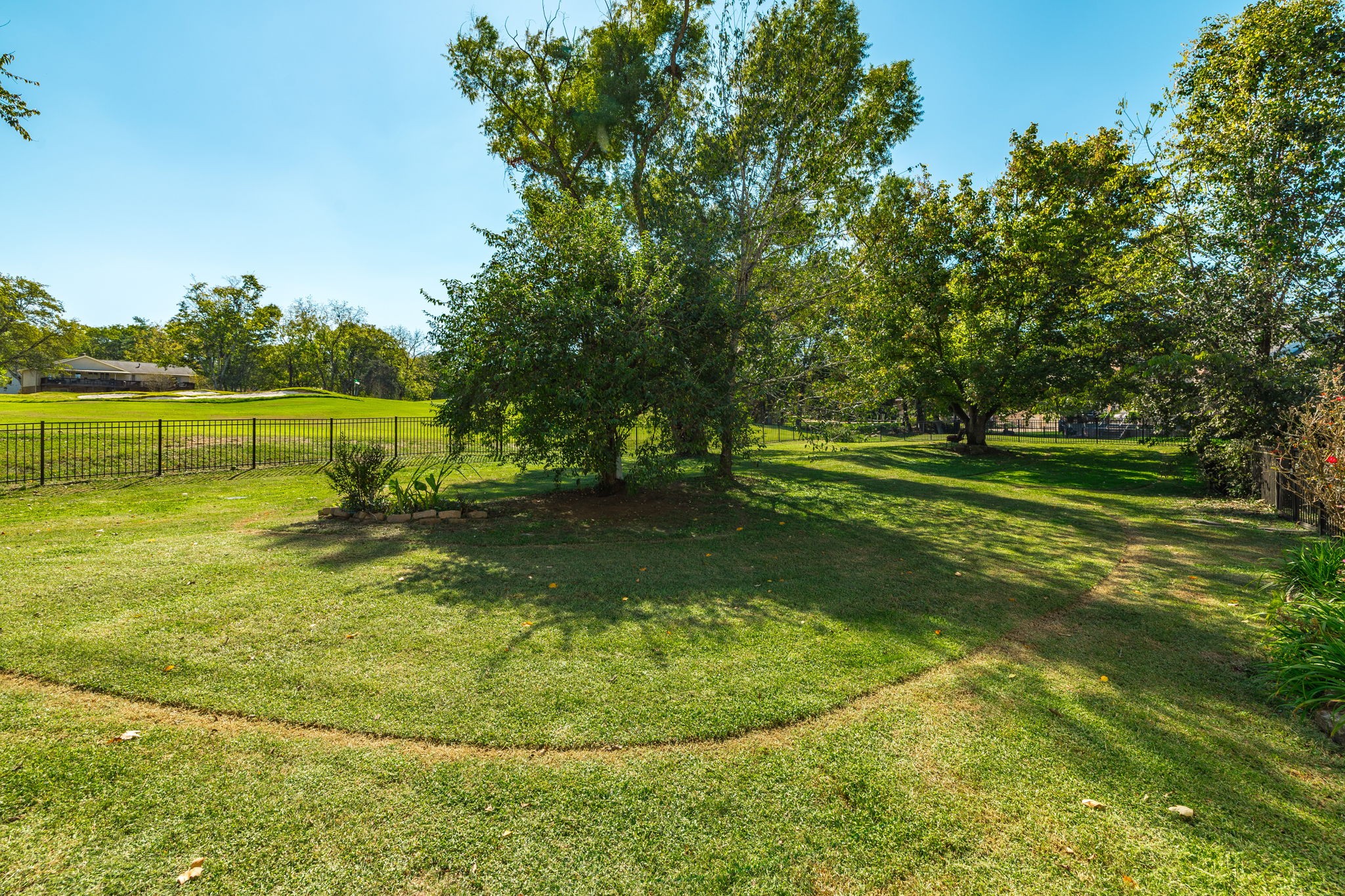 151 Baltusrol Road Franklin, TN 37069 - Photo 15 of 61 a view of a golf course with a lake
