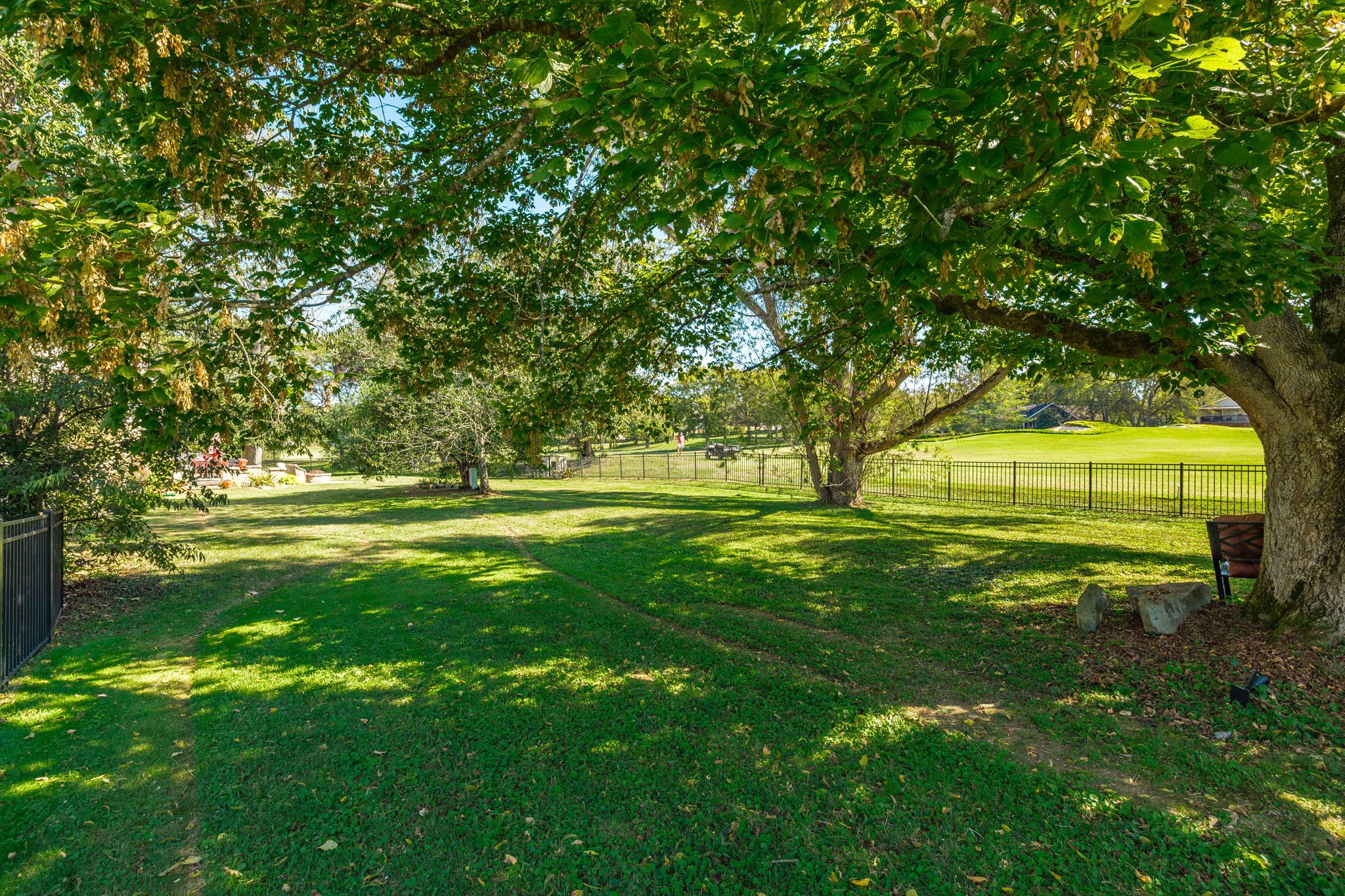 151 Baltusrol Road Franklin, TN 37069 - Photo 19 of 61 a view of a grassy field with trees