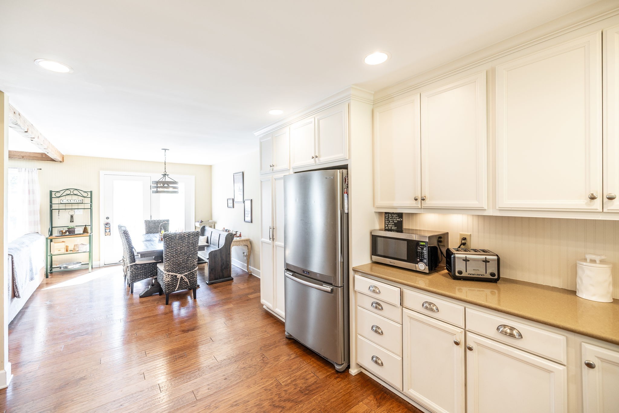 151 Baltusrol Road Franklin, TN 37069 - Photo 44 of 61 a kitchen with stainless steel appliances granite countertop a refrigerator sink and cabinets