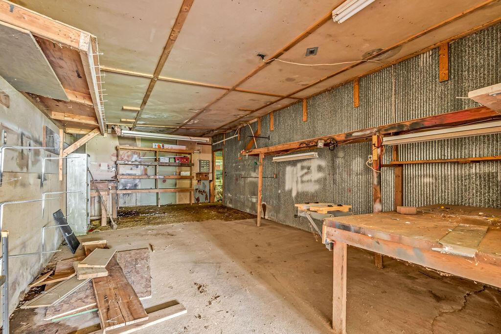 4409 Newton Road Northeast Newark, OH 43055 - Photo 78 of 87 • Stucco exterior • Concrete flooring • Fuel oil furnace (Working order unknown) • Rear garage door • 6-8 car attached garage
