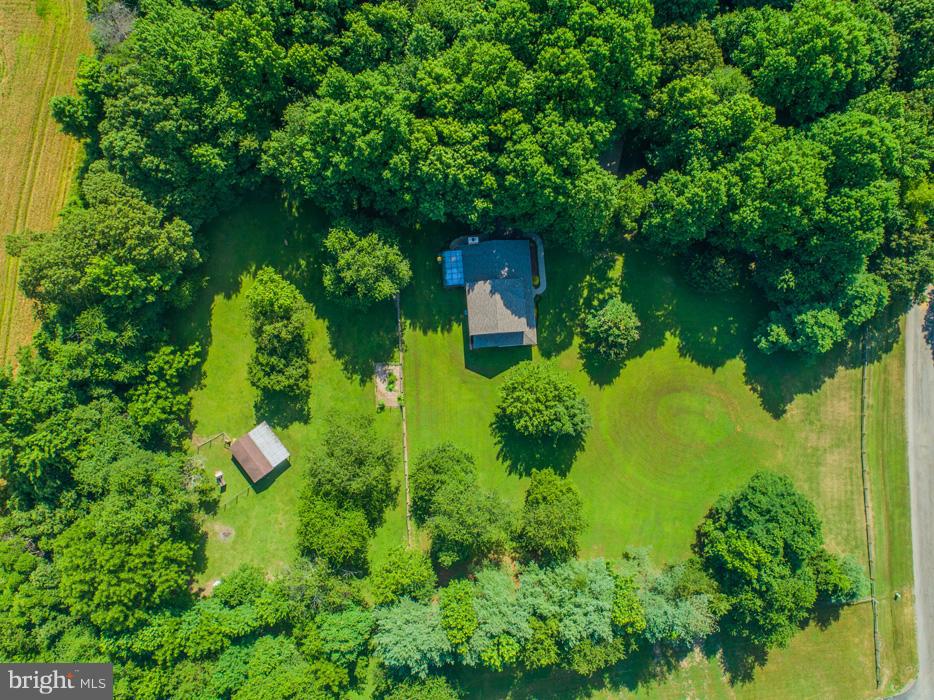216 Serene Road Friendship, MD 20758 - Photo 2 of 29 an aerial view of residential house with outdoor space and trees all around