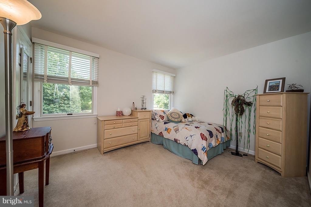 216 Serene Road Friendship, MD 20758 - Photo 23 of 29 a bed room with a bed and a window
