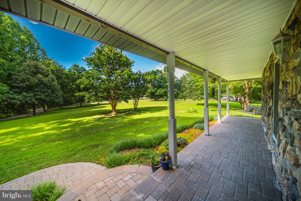 216 Serene Road Friendship, MD 20758 - Photo 9 of 29 a view of a big yard with potted plants