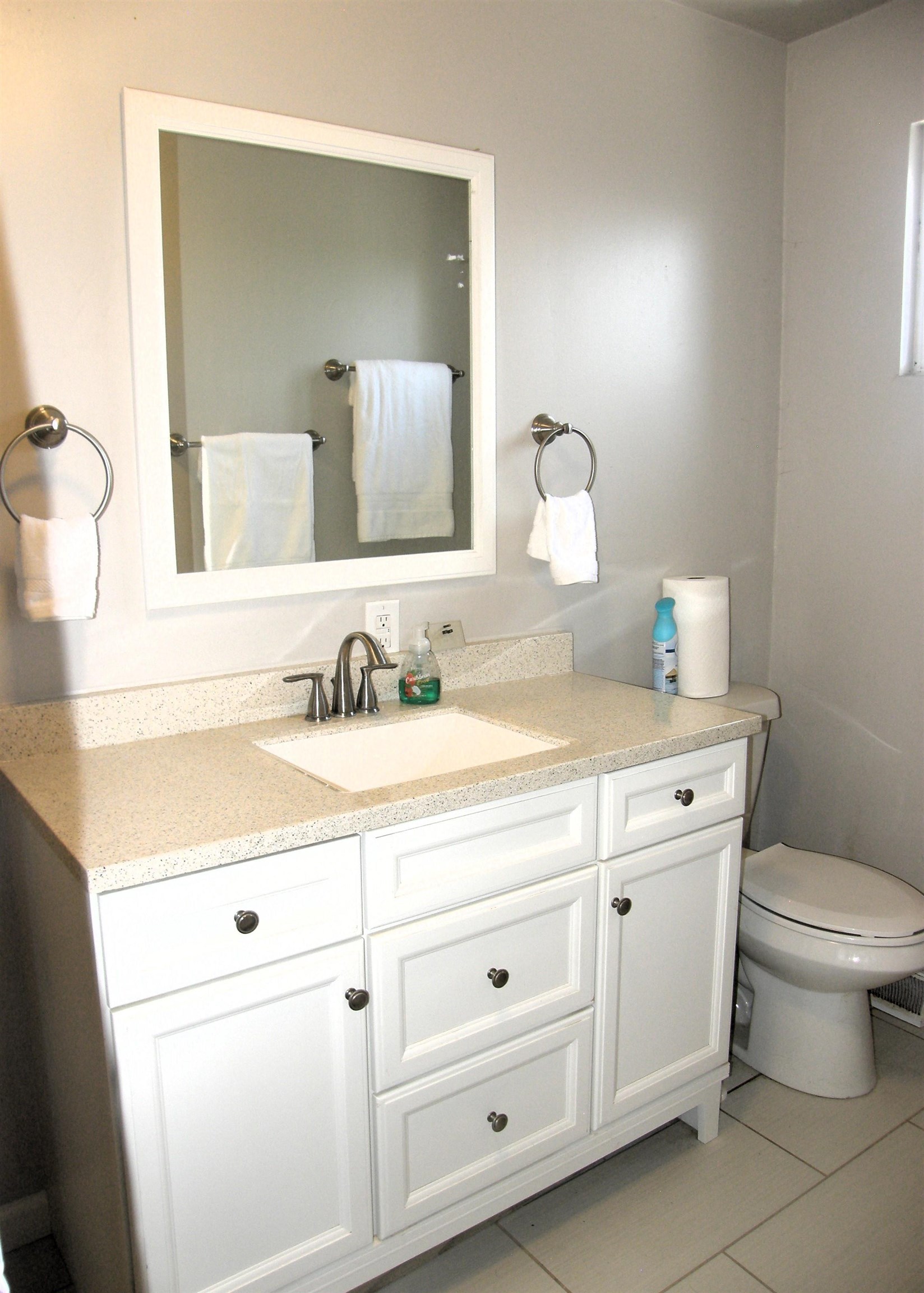 1163 16 Road Fruita, CO 81521 - Photo 29 of 42 a bathroom with a toilet sink and mirror