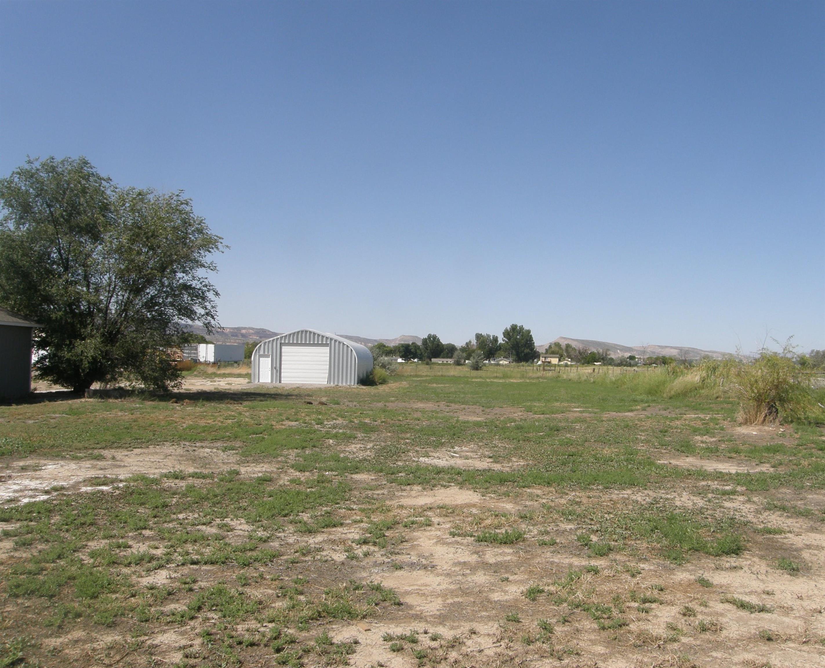 1163 16 Road Fruita, CO 81521 - Photo 41 of 42 a view of a field with an ocean