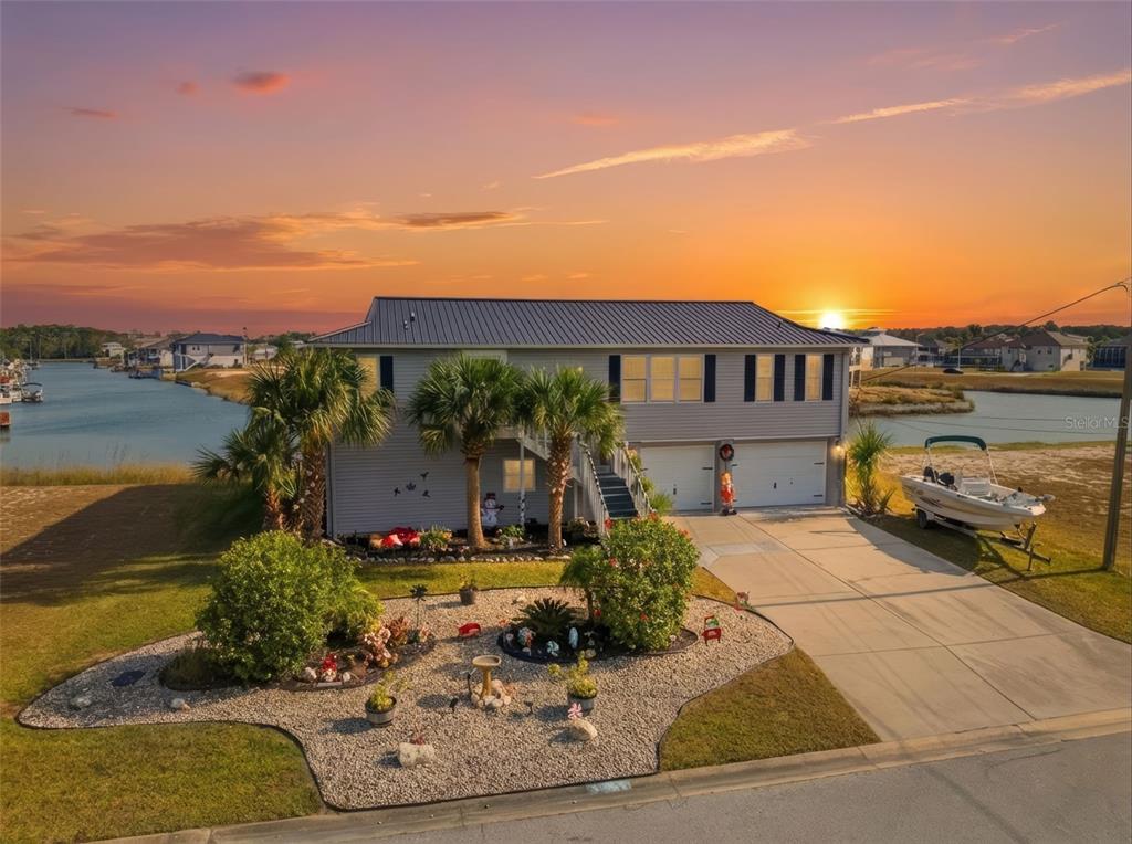 3366 Bluefish Drive Hernando Beach, FL 34607 - Photo 1 of 75 a view of a house with a ocean view