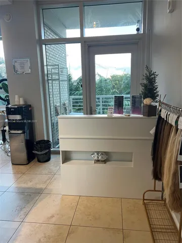 a view of empty room with stairs