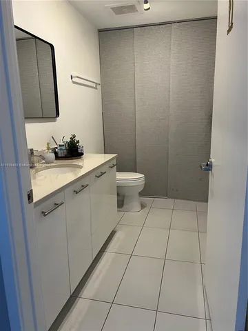 a bathroom with a mirror