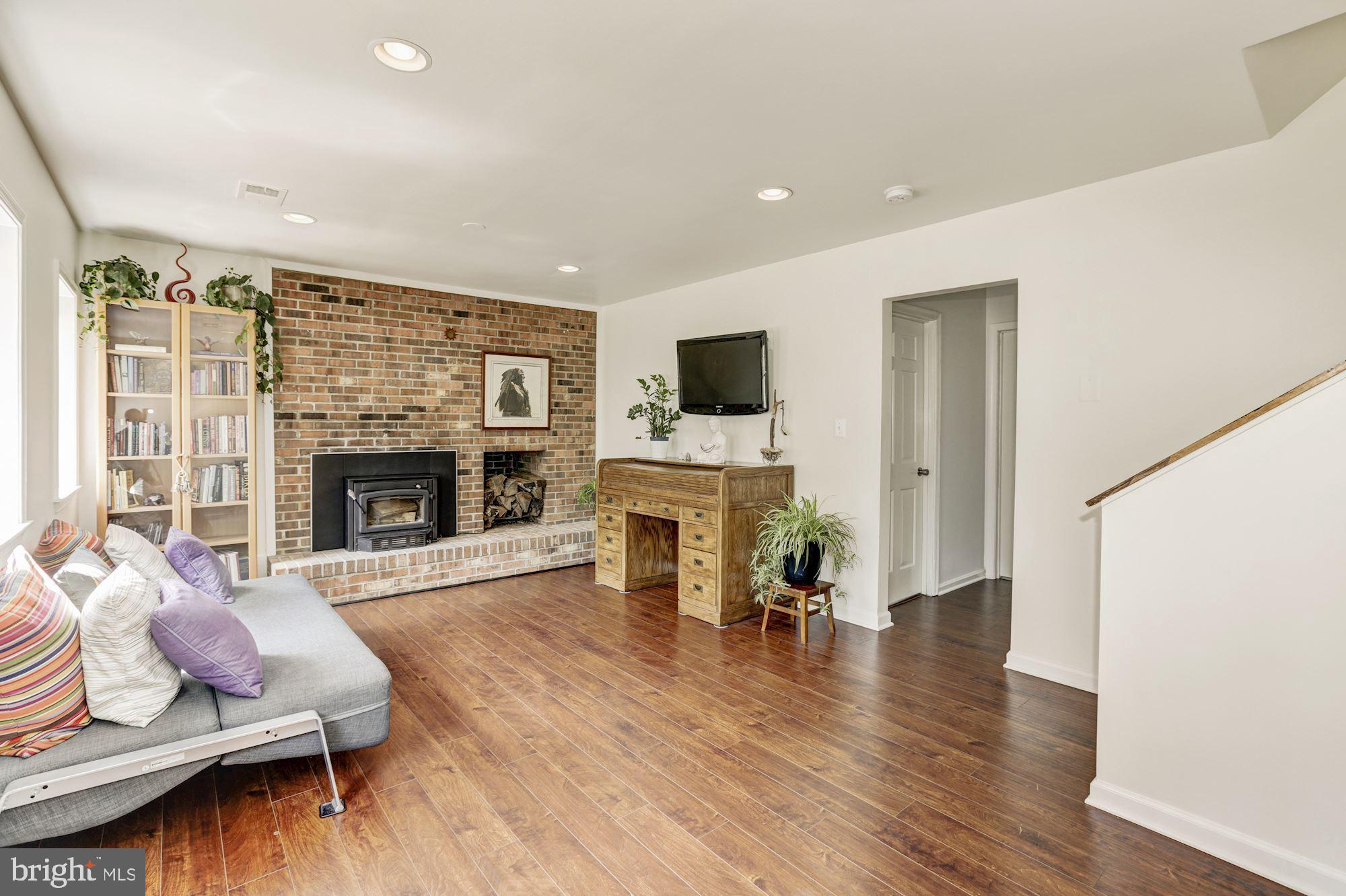 8026 Stillbrooke Road Manassas, VA 20112 - Photo 14 of 33 Family room with woodstove