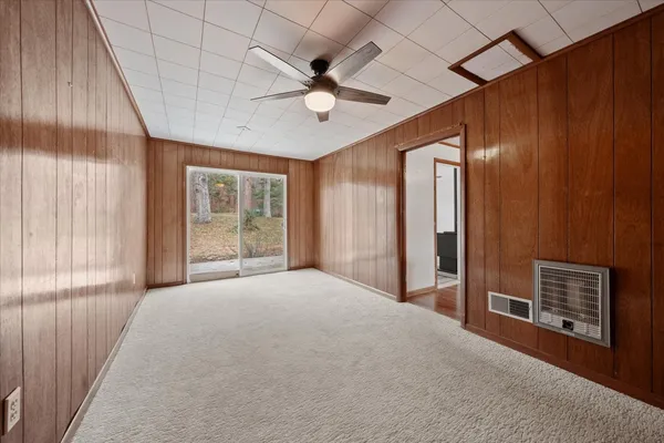 a view of an empty room with a window