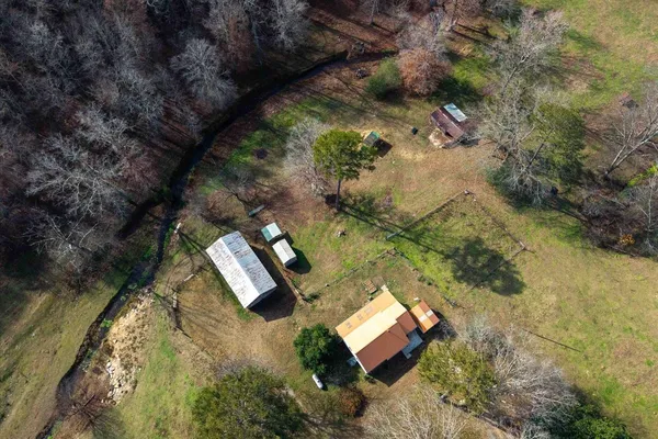 an aerial view of residential house with outdoor space
