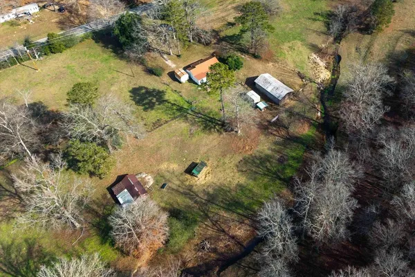 an aerial view of residential house with outdoor space