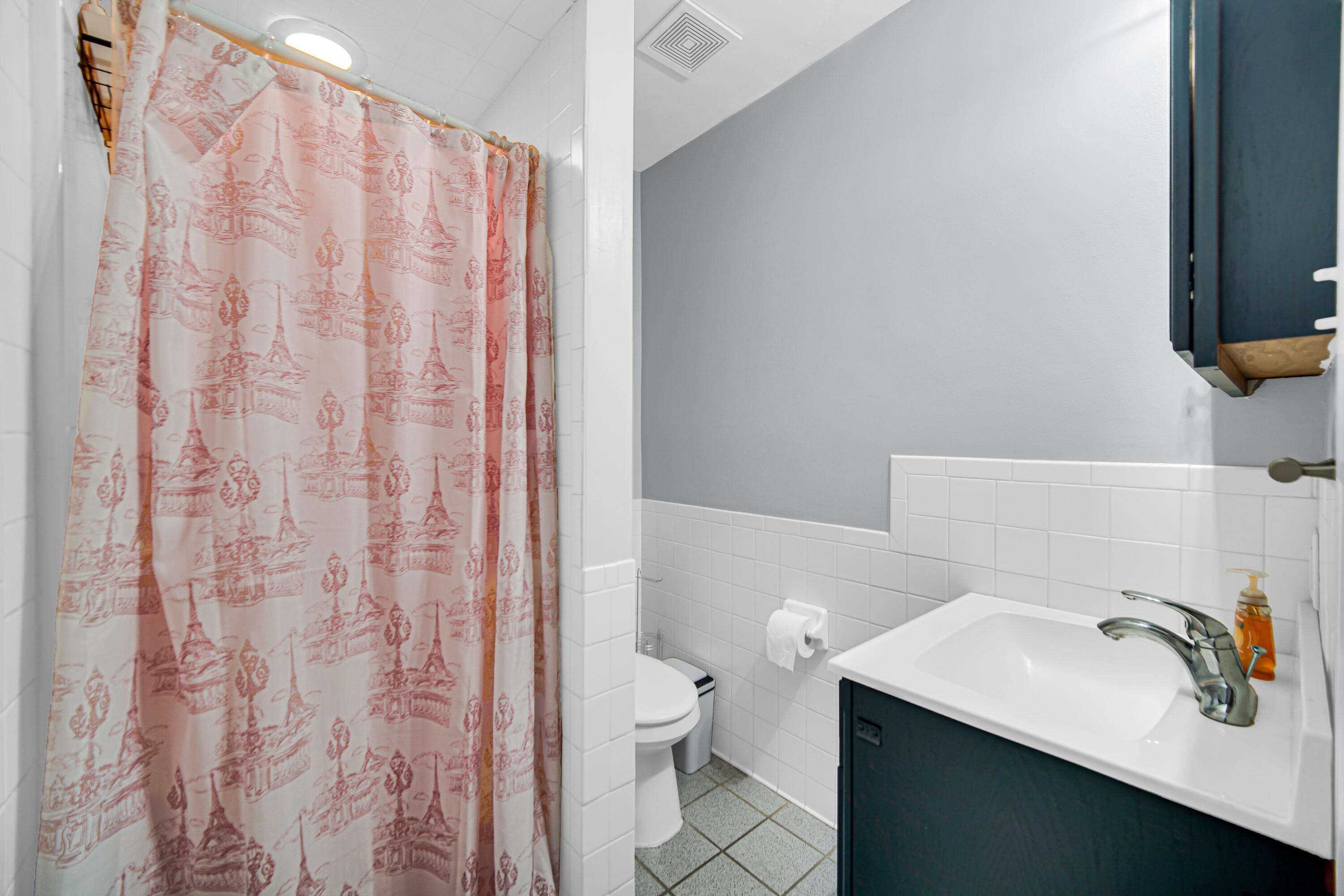 9017 Mathews Street Crown Point, IN 46307 - Photo 19 of 20 a bathroom with a sink toilet and shower