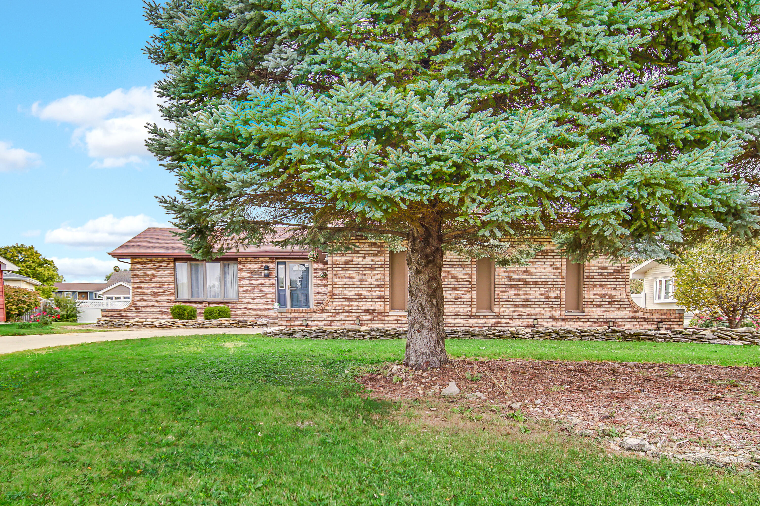9017 Mathews Street Crown Point, IN 46307 - Photo 2 of 20 a house view with a garden space