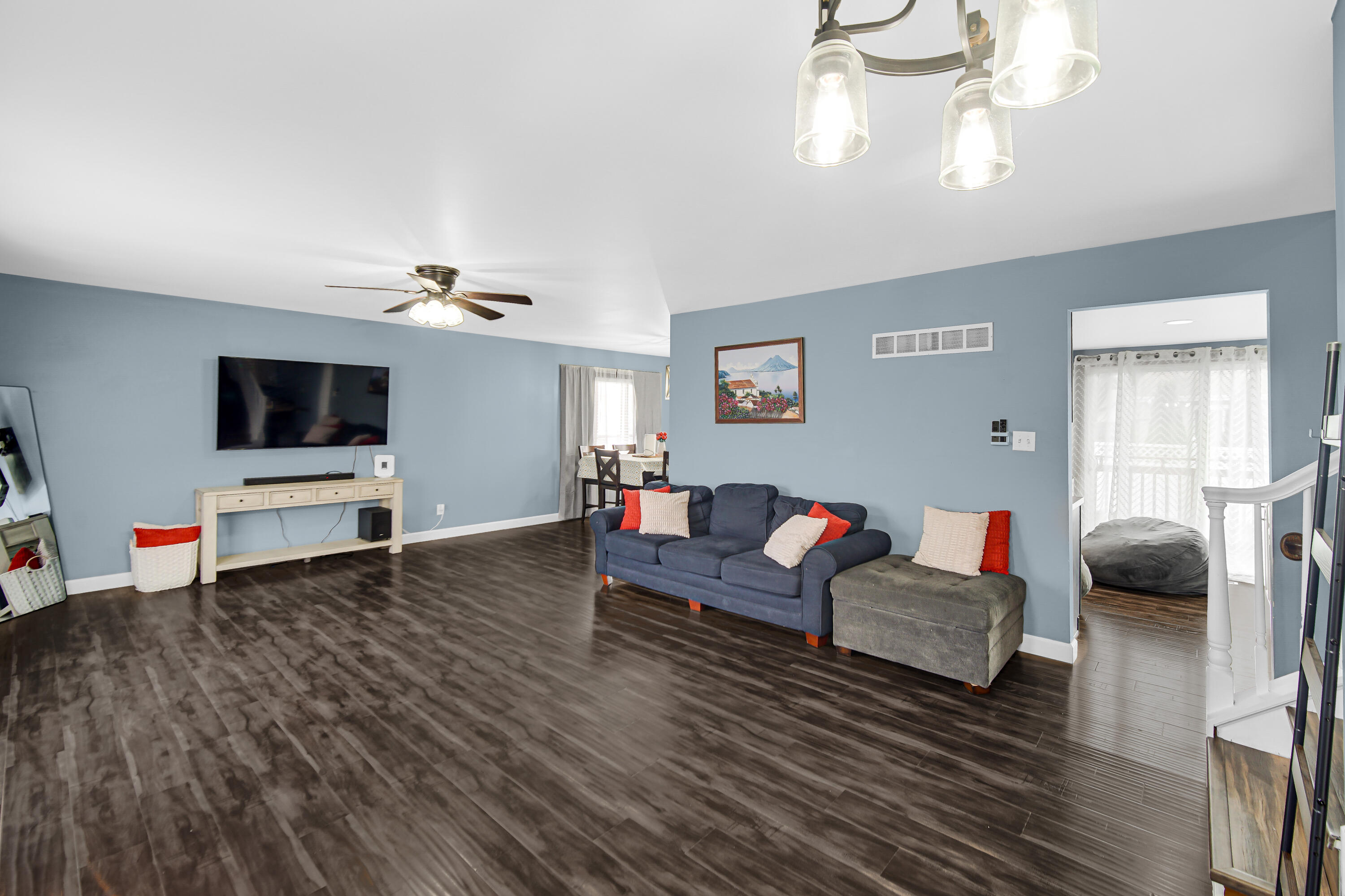 9017 Mathews Street Crown Point, IN 46307 - Photo 3 of 20 a living room with furniture and a flat screen tv