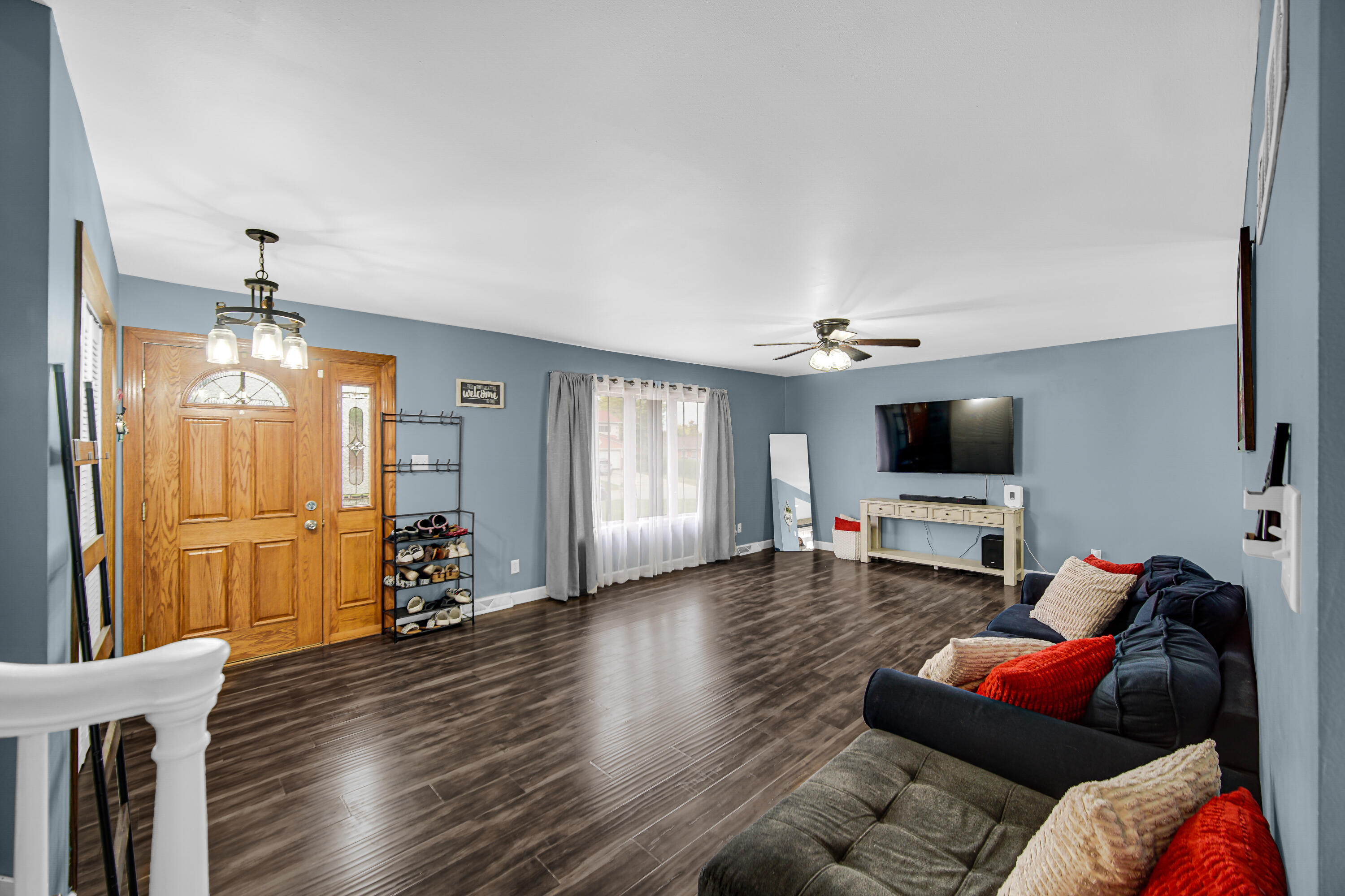 9017 Mathews Street Crown Point, IN 46307 - Photo 4 of 20 a living room with furniture and a flat screen tv