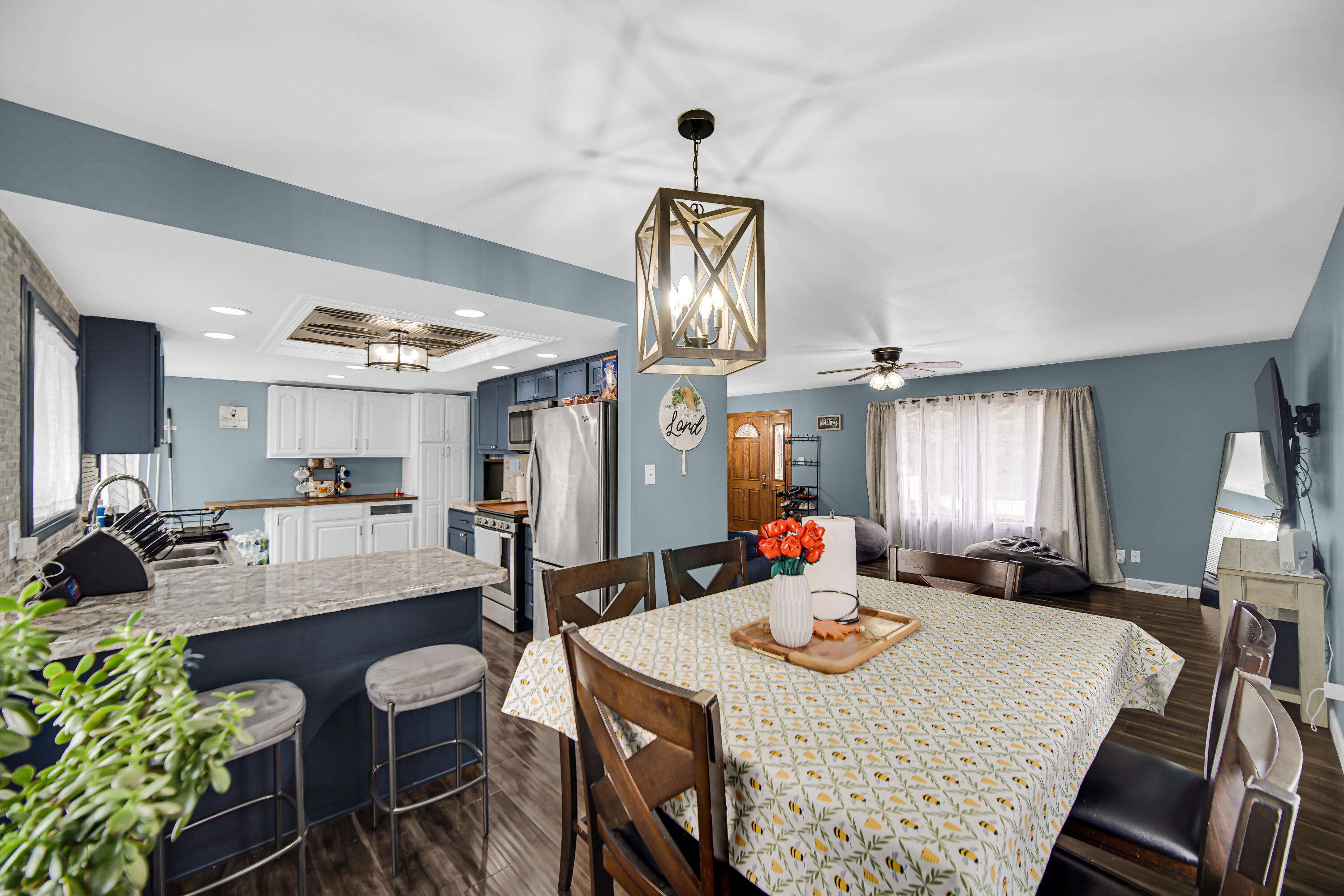 9017 Mathews Street Crown Point, IN 46307 - Photo 7 of 20 a view of a dining room with furniture