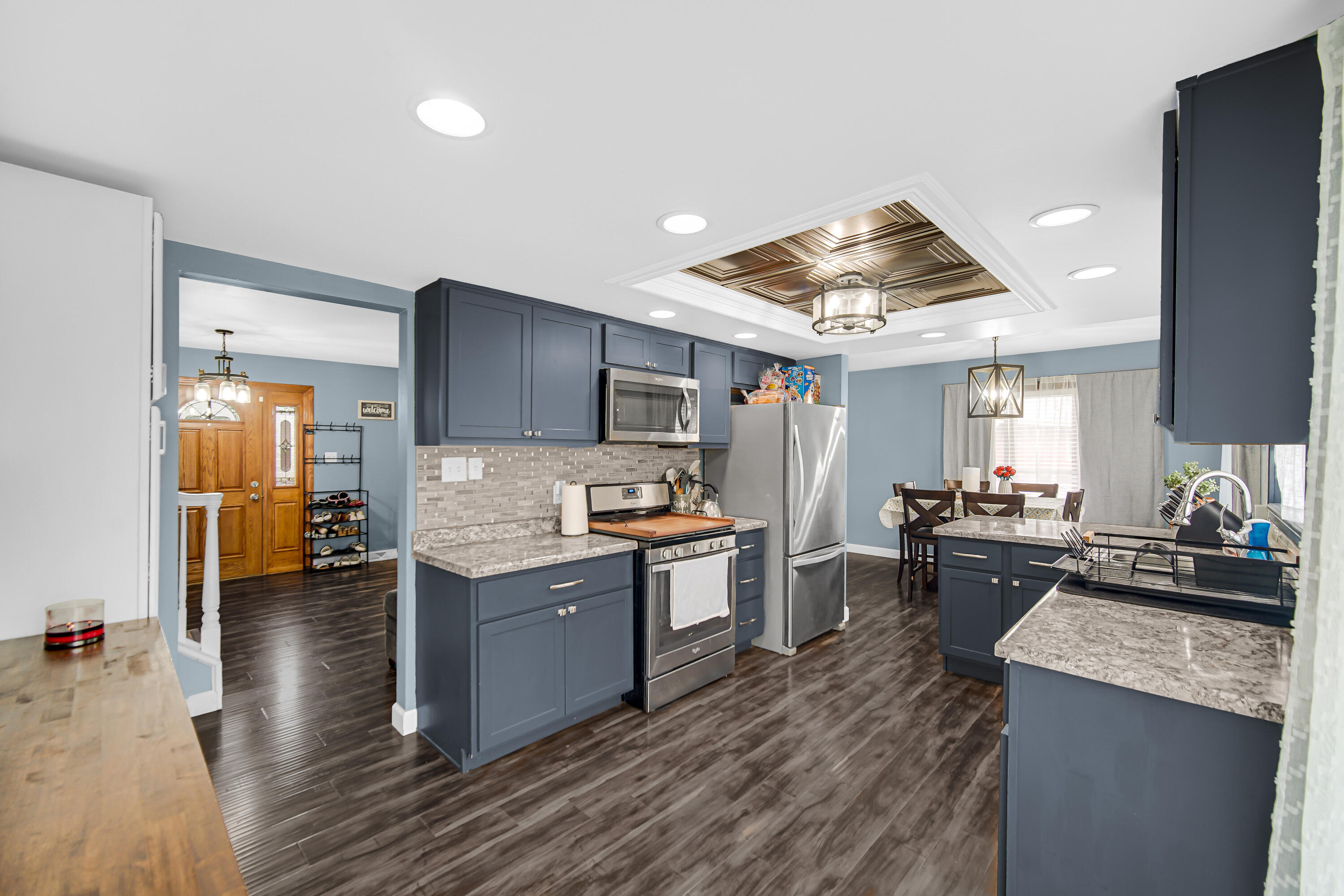 9017 Mathews Street Crown Point, IN 46307 - Photo 9 of 20 a kitchen with a stove and a refrigerator