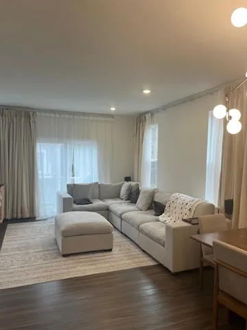 a living room with furniture and a couch