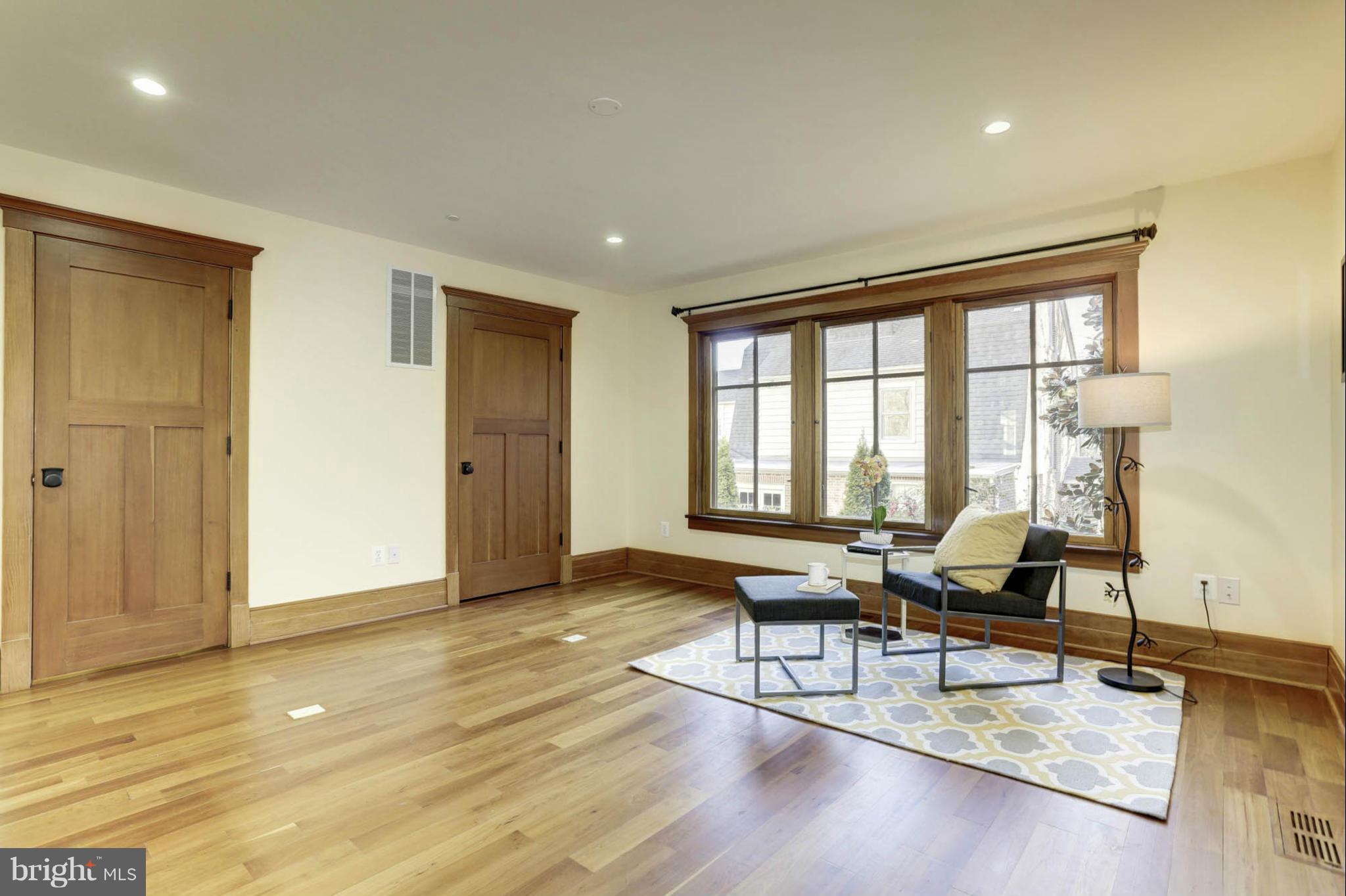 24 Dean Street Annapolis, MD 21401 - Photo 8 of 30 a living room with furniture and a wooden floor