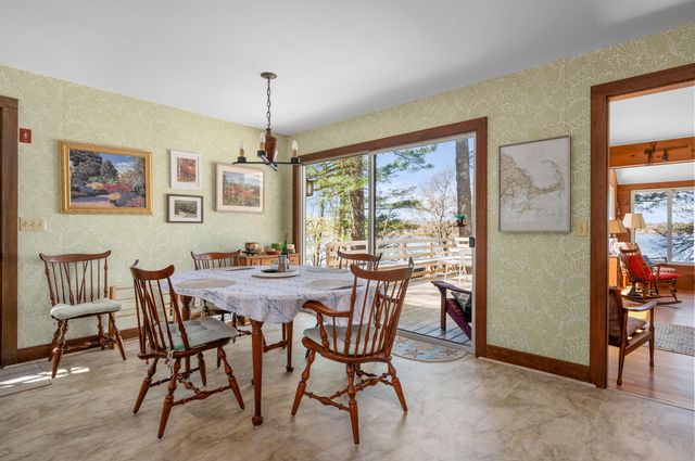a bedroom with two beds and painted walls