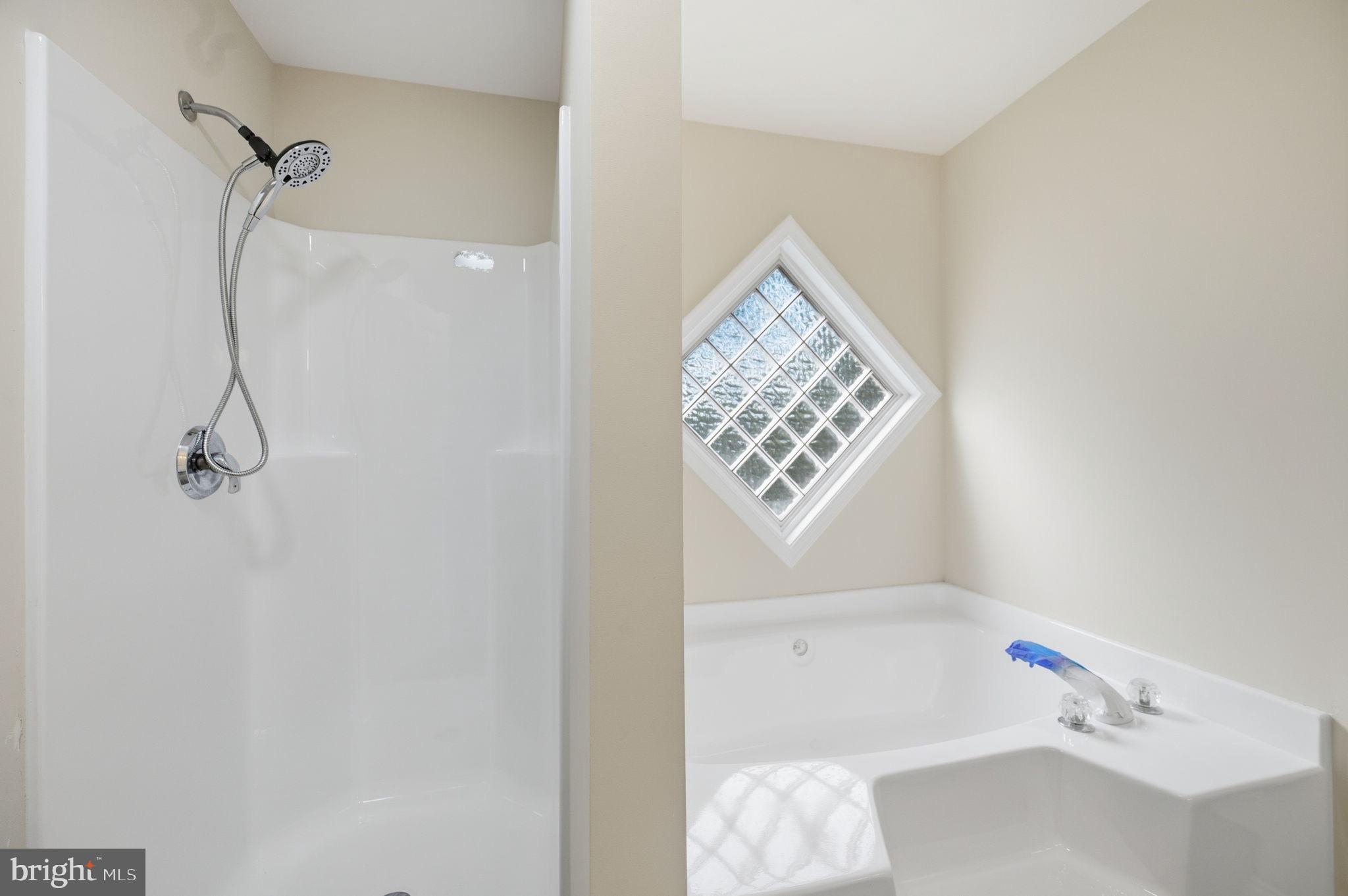 14 Ryland Road Stafford, VA 22556 - Photo 21 of 26 Modern bathroom with shower and tub.